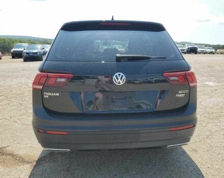 Черный Фольксваген Тигуан, объемом двигателя 2 л и пробегом 74 тыс. км за 3500 $, фото 5 на Automoto.ua