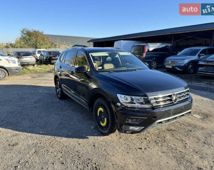 Черный Фольксваген Тигуан, объемом двигателя 2 л и пробегом 133 тыс. км за 11900 $, фото 3 на Automoto.ua