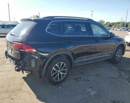 Черный Фольксваген Тигуан, объемом двигателя 2 л и пробегом 64 тыс. км за 4000 $, фото 2 на Automoto.ua