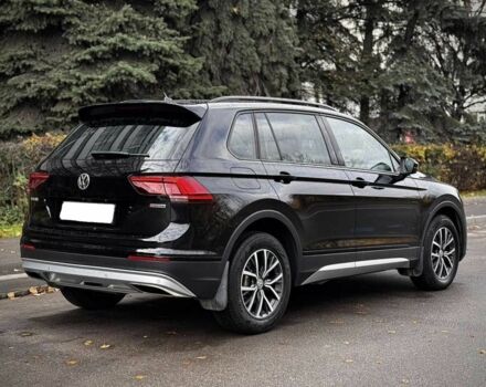 Чорний Фольксваген Тігуан, об'ємом двигуна 2 л та пробігом 134 тис. км за 22000 $, фото 1 на Automoto.ua