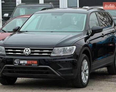 Чорний Фольксваген Тігуан, об'ємом двигуна 2 л та пробігом 129 тис. км за 17500 $, фото 2 на Automoto.ua