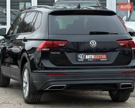 Чорний Фольксваген Тігуан, об'ємом двигуна 2 л та пробігом 129 тис. км за 17500 $, фото 6 на Automoto.ua