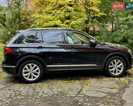 Чорний Фольксваген Тігуан, об'ємом двигуна 1.97 л та пробігом 70 тис. км за 31500 $, фото 2 на Automoto.ua