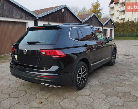Черный Фольксваген Тигуан, объемом двигателя 2 л и пробегом 96 тыс. км за 16300 $, фото 1 на Automoto.ua