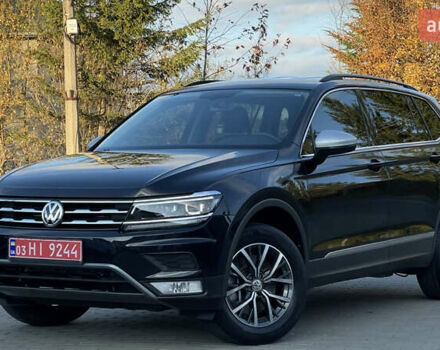 Черный Фольксваген Тигуан, объемом двигателя 2 л и пробегом 170 тыс. км за 18799 $, фото 2 на Automoto.ua