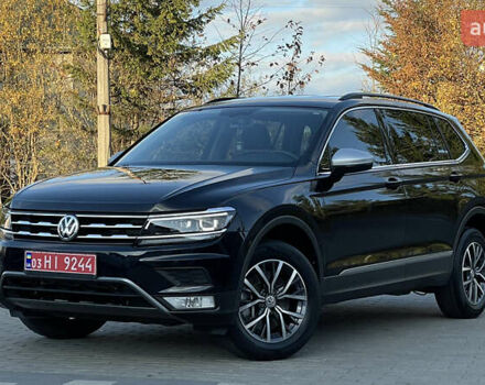 Черный Фольксваген Тигуан, объемом двигателя 2 л и пробегом 170 тыс. км за 18799 $, фото 1 на Automoto.ua