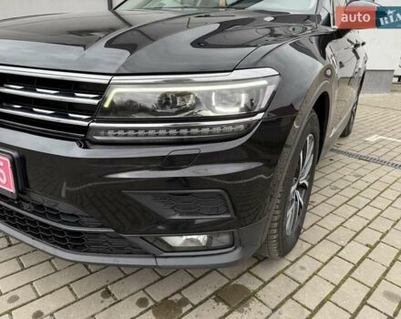 Чорний Фольксваген Тігуан, об'ємом двигуна 2 л та пробігом 228 тис. км за 26900 $, фото 23 на Automoto.ua