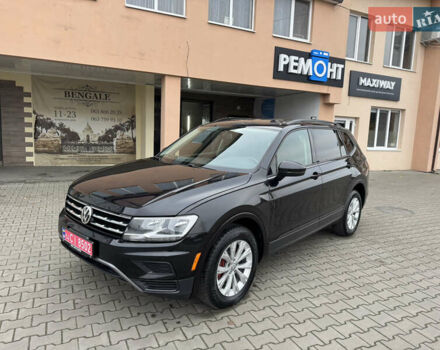 Чорний Фольксваген Тігуан, об'ємом двигуна 2 л та пробігом 232 тис. км за 14200 $, фото 1 на Automoto.ua