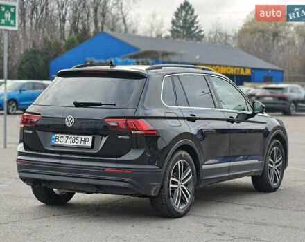 Черный Фольксваген Тигуан, объемом двигателя 1.97 л и пробегом 208 тыс. км за 25300 $, фото 7 на Automoto.ua