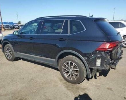 Черный Фольксваген Тигуан, объемом двигателя 2 л и пробегом 64 тыс. км за 4000 $, фото 1 на Automoto.ua