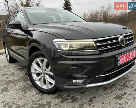 Черный Фольксваген Тигуан, объемом двигателя 2 л и пробегом 227 тыс. км за 24100 $, фото 1 на Automoto.ua