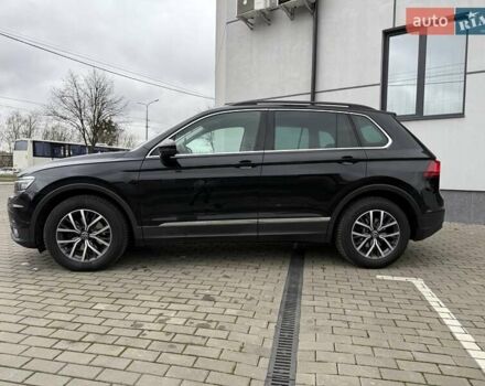 Чорний Фольксваген Тігуан, об'ємом двигуна 2 л та пробігом 228 тис. км за 26900 $, фото 3 на Automoto.ua