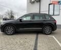 Чорний Фольксваген Тігуан, об'ємом двигуна 2 л та пробігом 228 тис. км за 26900 $, фото 3 на Automoto.ua