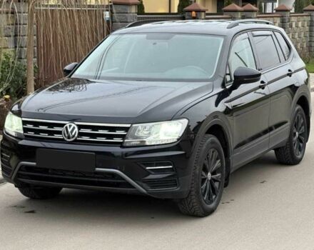 Черный Фольксваген Тигуан, объемом двигателя 2 л и пробегом 184 тыс. км за 18500 $, фото 1 на Automoto.ua