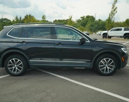 Чорний Фольксваген Тігуан, об'ємом двигуна 2 л та пробігом 47 тис. км за 9500 $, фото 5 на Automoto.ua