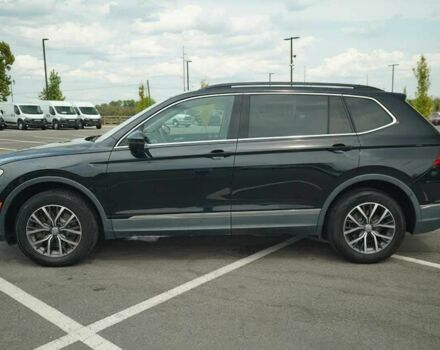 Чорний Фольксваген Тігуан, об'ємом двигуна 2 л та пробігом 47 тис. км за 9500 $, фото 3 на Automoto.ua