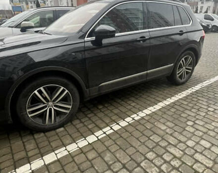 Черный Фольксваген Тигуан, объемом двигателя 1.97 л и пробегом 208 тыс. км за 27500 $, фото 1 на Automoto.ua