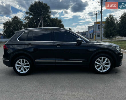Чорний Фольксваген Тігуан, об'ємом двигуна 1.97 л та пробігом 115 тис. км за 31000 $, фото 3 на Automoto.ua