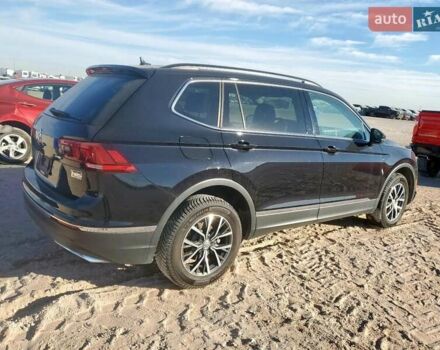 Чорний Фольксваген Тігуан, об'ємом двигуна 1.98 л та пробігом 54 тис. км за 4400 $, фото 2 на Automoto.ua