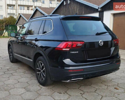 Черный Фольксваген Тигуан, объемом двигателя 2 л и пробегом 96 тыс. км за 16300 $, фото 2 на Automoto.ua