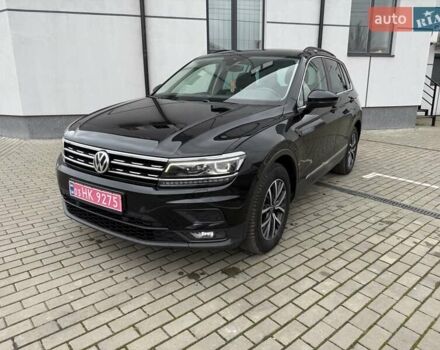Чорний Фольксваген Тігуан, об'ємом двигуна 2 л та пробігом 228 тис. км за 26900 $, фото 2 на Automoto.ua