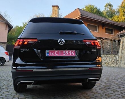 Чорний Фольксваген Тігуан, об'ємом двигуна 2 л та пробігом 213 тис. км за 16900 $, фото 4 на Automoto.ua