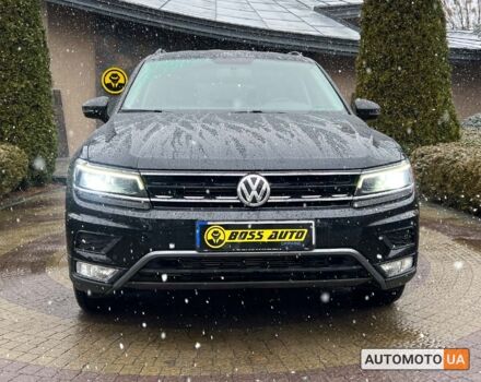 Чорний Фольксваген Тігуан, об'ємом двигуна 2 л та пробігом 37 тис. км за 25800 $, фото 1 на Automoto.ua