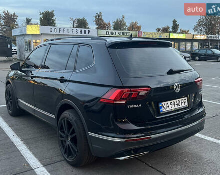Чорний Фольксваген Тігуан, об'ємом двигуна 2 л та пробігом 56 тис. км за 23700 $, фото 3 на Automoto.ua
