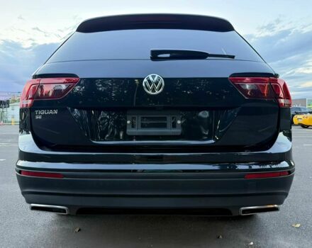 Чорний Фольксваген Тігуан, об'ємом двигуна 2 л та пробігом 11 тис. км за 6300 $, фото 4 на Automoto.ua