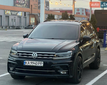 Чорний Фольксваген Тігуан, об'ємом двигуна 2 л та пробігом 56 тис. км за 23700 $, фото 1 на Automoto.ua