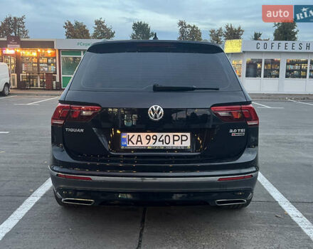 Чорний Фольксваген Тігуан, об'ємом двигуна 2 л та пробігом 56 тис. км за 23700 $, фото 4 на Automoto.ua