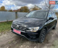 Черный Фольксваген Тигуан, объемом двигателя 2 л и пробегом 107 тыс. км за 21500 $, фото 1 на Automoto.ua