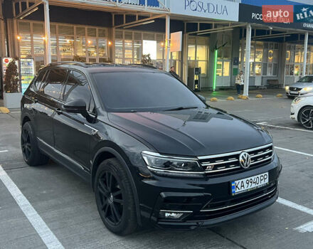 Чорний Фольксваген Тігуан, об'ємом двигуна 2 л та пробігом 56 тис. км за 23700 $, фото 2 на Automoto.ua