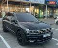 Чорний Фольксваген Тігуан, об'ємом двигуна 2 л та пробігом 56 тис. км за 23700 $, фото 2 на Automoto.ua