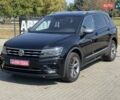Чорний Фольксваген Тігуан, об'ємом двигуна 1.97 л та пробігом 300 тис. км за 28500 $, фото 1 на Automoto.ua