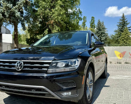 Черный Фольксваген Тигуан, объемом двигателя 1.98 л и пробегом 128 тыс. км за 23000 $, фото 1 на Automoto.ua