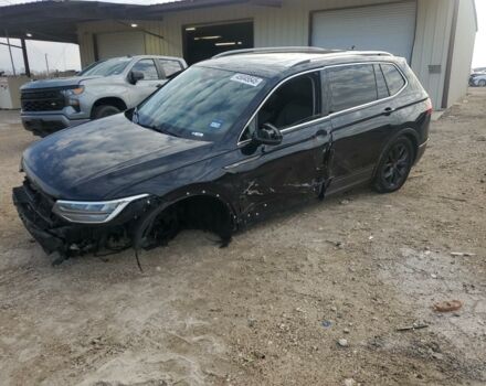 Чорний Фольксваген Тігуан, об'ємом двигуна 2 л та пробігом 63 тис. км за 15500 $, фото 2 на Automoto.ua