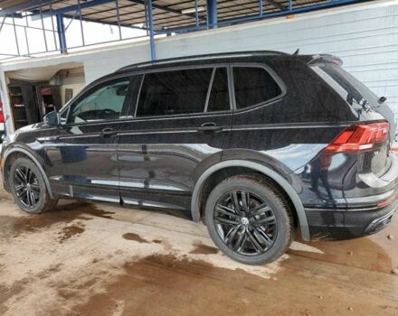 Чорний Фольксваген Тігуан, об'ємом двигуна 2 л та пробігом 51 тис. км за 16000 $, фото 1 на Automoto.ua