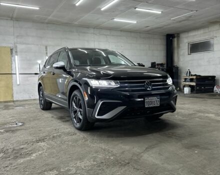 Черный Фольксваген Тигуан, объемом двигателя 2 л и пробегом 115 тыс. км за 21499 $, фото 1 на Automoto.ua