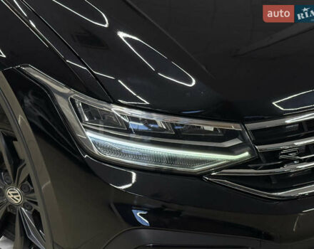 Чорний Фольксваген Тігуан, об'ємом двигуна 2 л та пробігом 98 тис. км за 25999 $, фото 7 на Automoto.ua