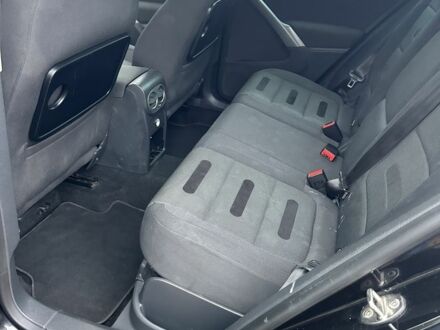 Черный Фольксваген Тигуан, объемом двигателя 1.4 л и пробегом 283 тыс. км за 5589 $, фото 1 на Automoto.ua