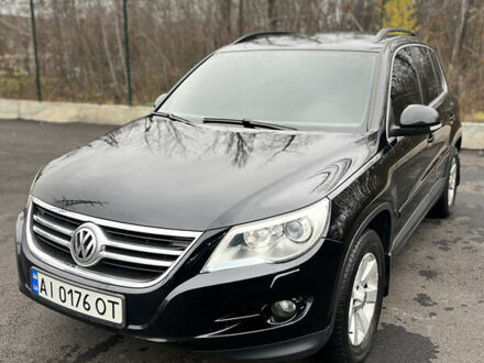 Черный Фольксваген Тигуан, объемом двигателя 1.98 л и пробегом 245 тыс. км за 9400 $, фото 1 на Automoto.ua