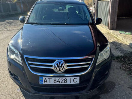 Чорний Фольксваген Тігуан, об'ємом двигуна 2 л та пробігом 270 тис. км за 11831 $, фото 1 на Automoto.ua