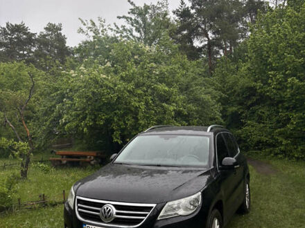 Черный Фольксваген Тигуан, объемом двигателя 1.39 л и пробегом 204 тыс. км за 9700 $, фото 1 на Automoto.ua