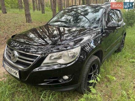 Черный Фольксваген Тигуан, объемом двигателя 1.97 л и пробегом 210 тыс. км за 11500 $, фото 1 на Automoto.ua
