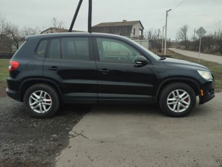 Черный Фольксваген Тигуан, объемом двигателя 2 л и пробегом 198 тыс. км за 9390 $, фото 1 на Automoto.ua
