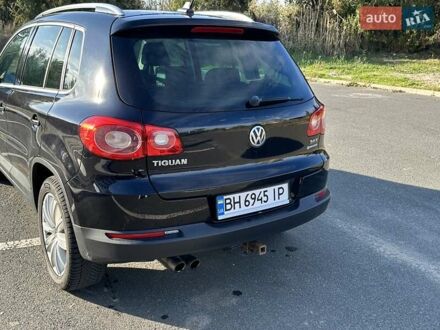 Черный Фольксваген Тигуан, объемом двигателя 2 л и пробегом 237 тыс. км за 10100 $, фото 1 на Automoto.ua