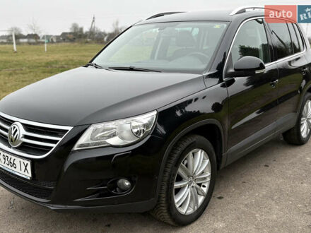 Черный Фольксваген Тигуан, объемом двигателя 1.39 л и пробегом 213 тыс. км за 9399 $, фото 1 на Automoto.ua