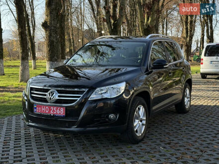 Чорний Фольксваген Тігуан, об'ємом двигуна 2 л та пробігом 257 тис. км за 12800 $, фото 1 на Automoto.ua