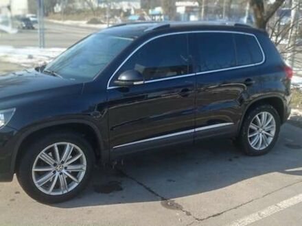 Чорний Фольксваген Тігуан, об'ємом двигуна 2 л та пробігом 174 тис. км за 13500 $, фото 1 на Automoto.ua